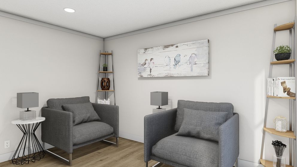 The ROCKET MAN Sitting Room. This Manufactured Mobile Home features 3 bedrooms and 2 baths.