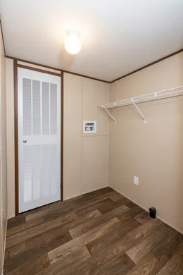 The CELEBRATION Utility Room. This Manufactured Mobile Home features 3 bedrooms and 2 baths.