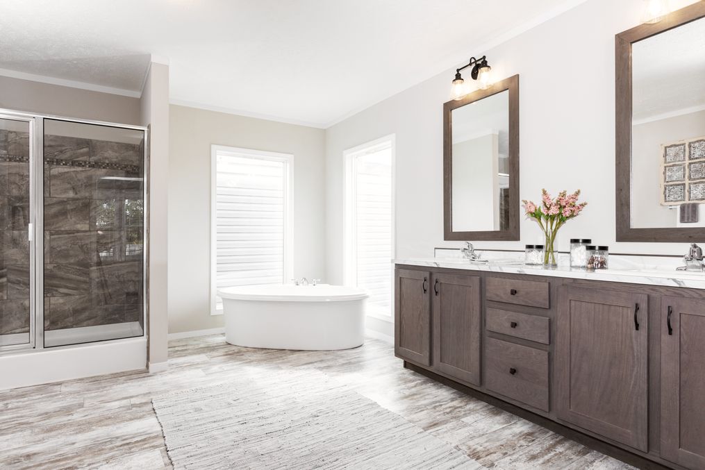 The COUNTRY AIRE Master Bathroom. This Manufactured Mobile Home features 3 bedrooms and 3 baths.