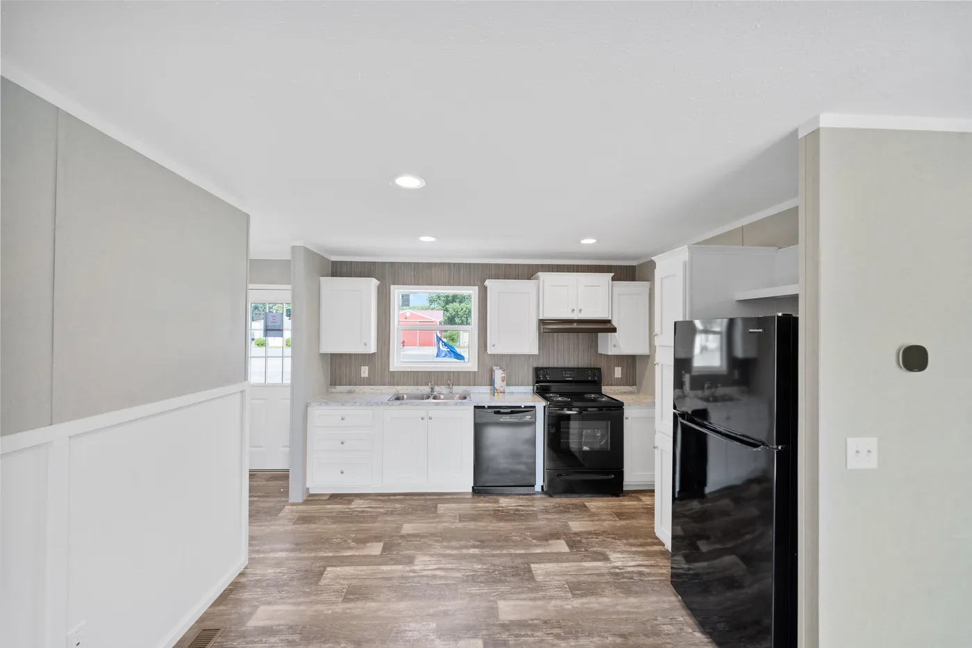 The ZIRCON Dining Area. This Manufactured Mobile Home features 3 bedrooms and 2 baths.