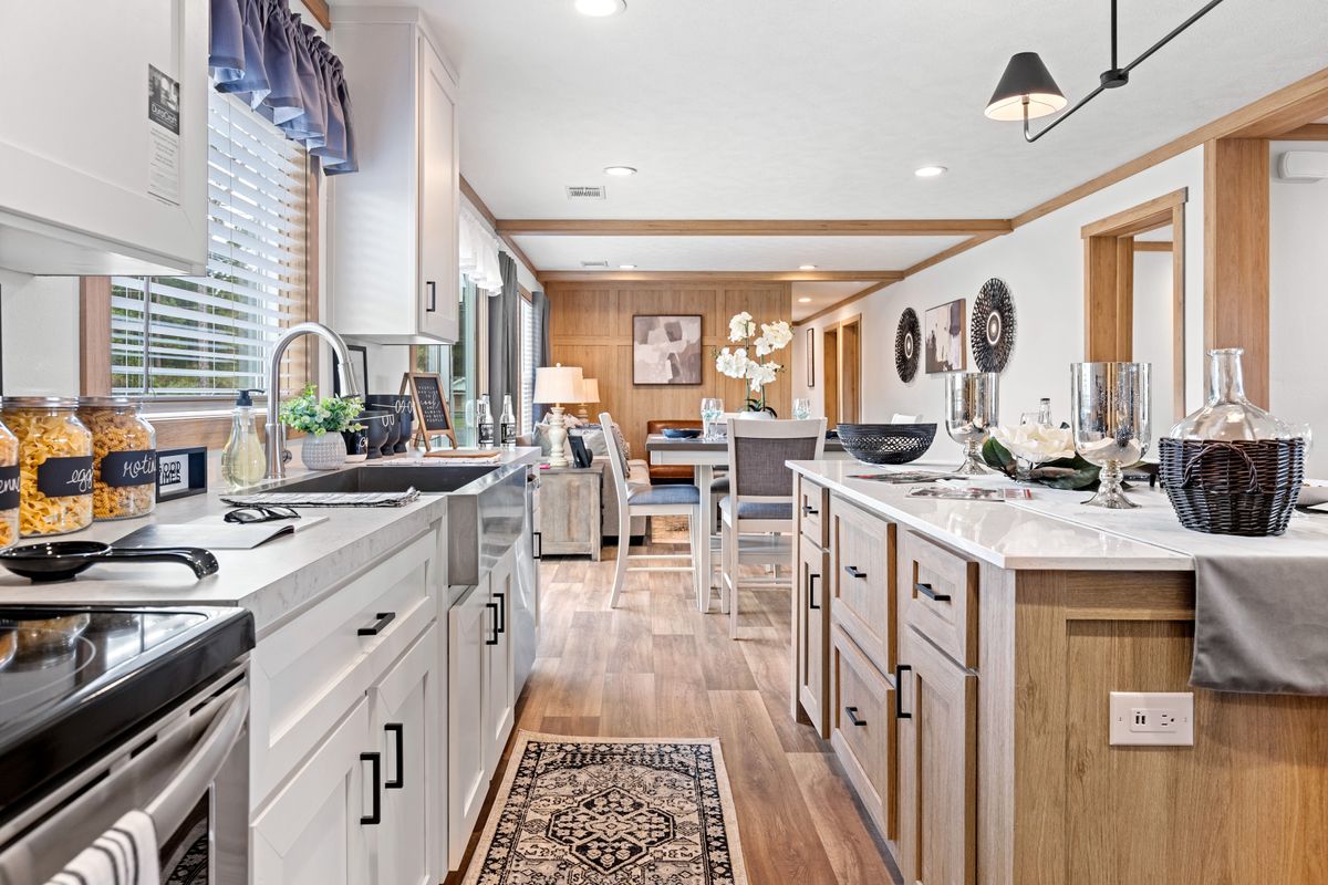 The THATCHER Kitchen. This Manufactured Mobile Home features 4 bedrooms and 2 baths.