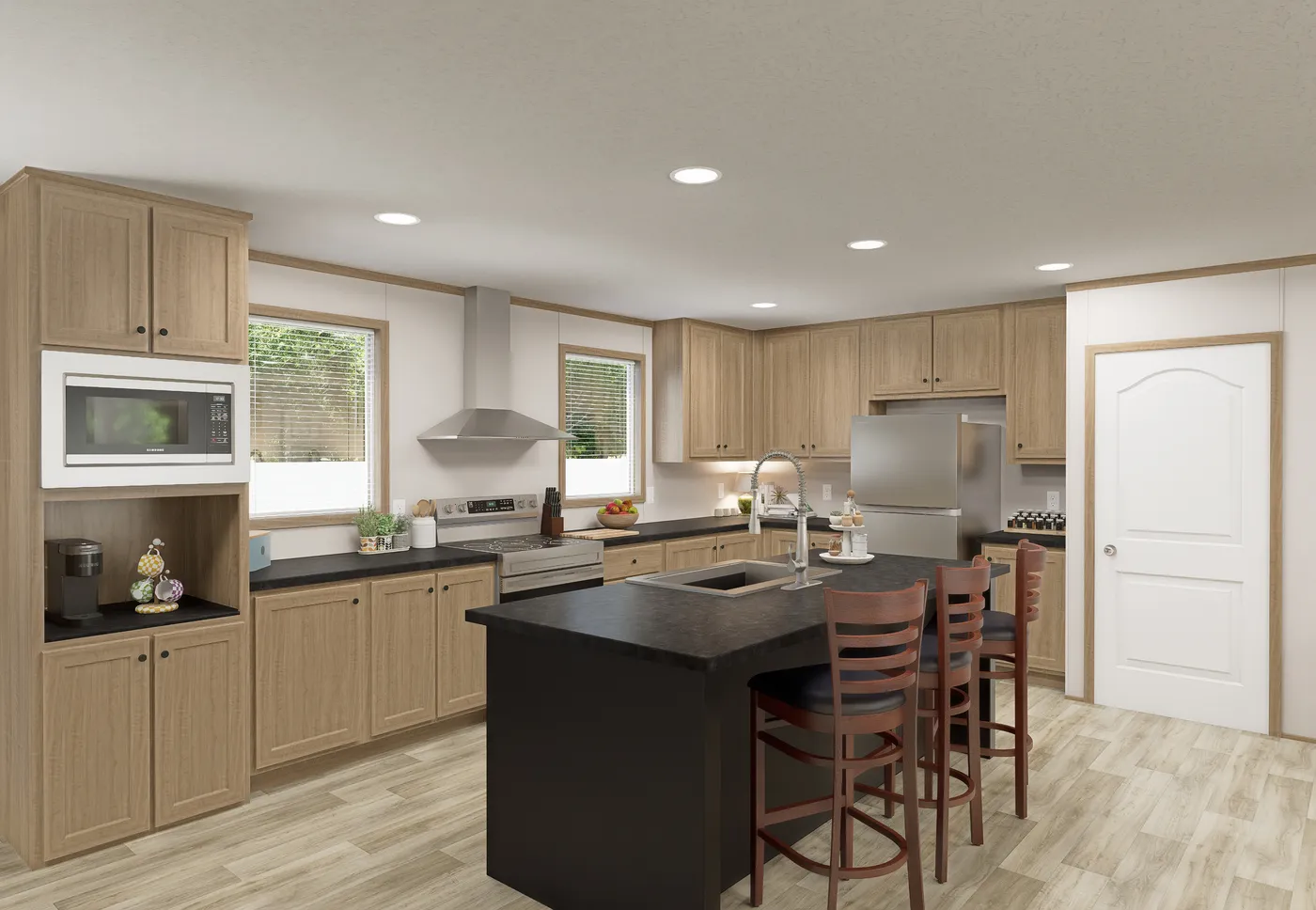 The THE MOUNTAINEER 72 Kitchen. This Manufactured Mobile Home features 3 bedrooms and 2 baths.