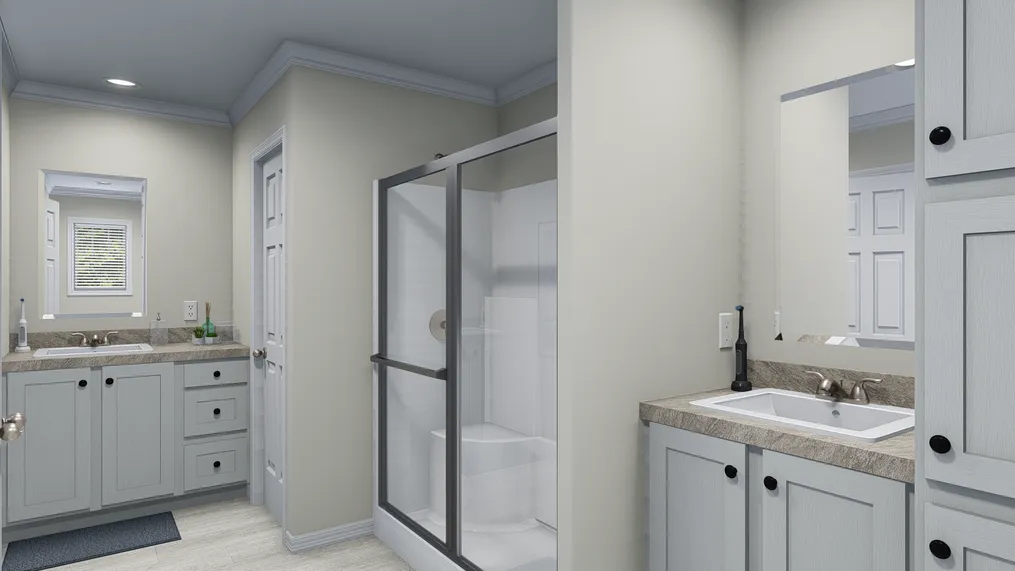 The 4204 "TOPSAIL" 7616 Primary Bathroom. This Manufactured Mobile Home features 3 bedrooms and 2 baths.