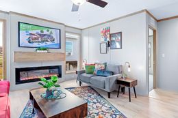 The BLUEBONNET BREEZE Den. This Manufactured Mobile Home features 3 bedrooms and 2 baths.