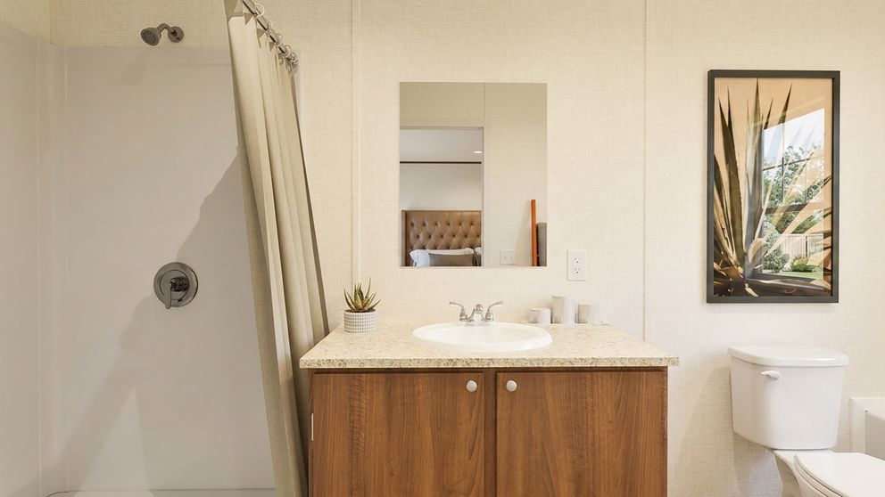 The ASPEN Primary Bathroom. This Manufactured Mobile Home features 3 bedrooms and 2 baths.