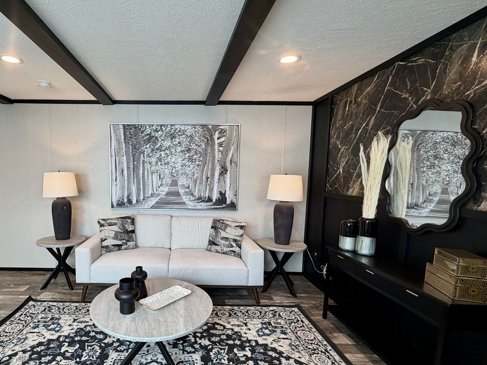 The PEARL Living Room. This Manufactured Mobile Home features 3 bedrooms and 2 baths.