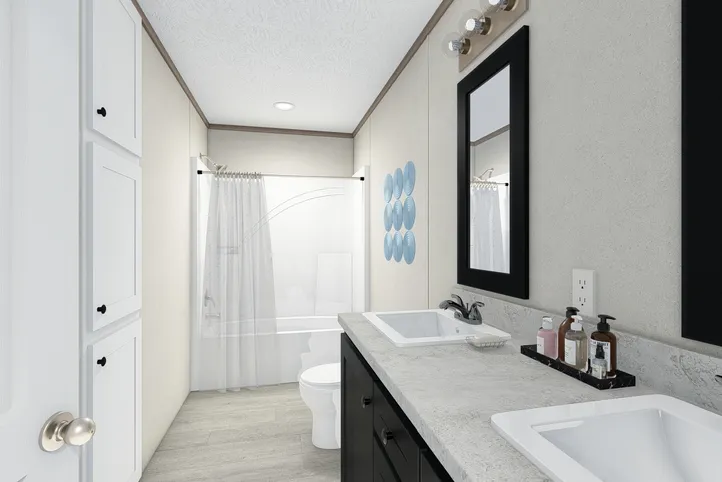 The 5628-E787 THE PULSE Primary Bathroom. This Manufactured Mobile Home features 3 bedrooms and 2 baths.