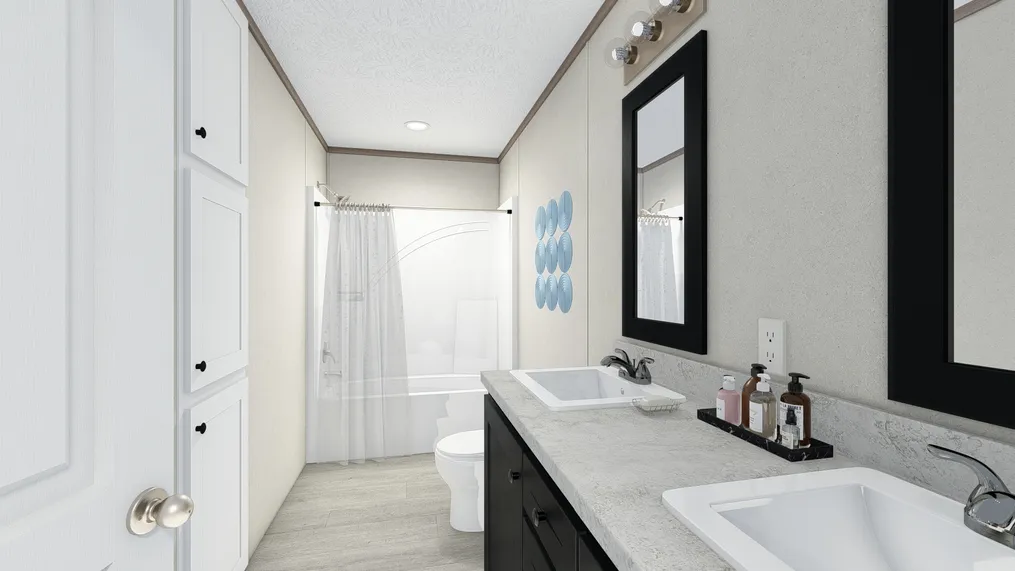 The 5628-E787 THE PULSE Primary Bathroom. This Manufactured Mobile Home features 3 bedrooms and 2 baths.