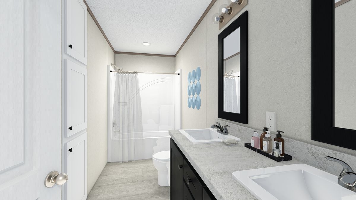 The 5628-E787 THE PULSE Primary Bathroom. This Manufactured Mobile Home features 3 bedrooms and 2 baths.