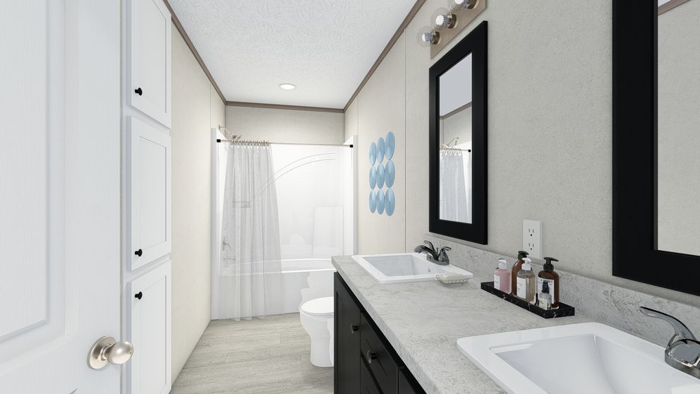 The 5628-E787 THE PULSE Primary Bathroom. This Manufactured Mobile Home features 3 bedrooms and 2 baths.