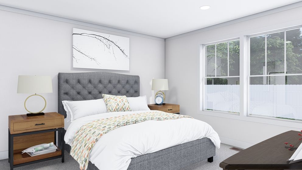 The STAYIN' ALIVE Primary Bedroom. This Manufactured Mobile Home features 3 bedrooms and 2 baths.