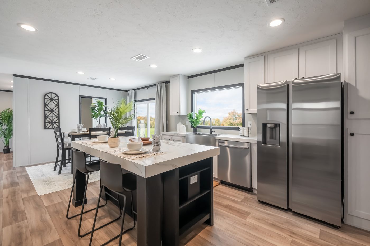 The THE ANNIVERSARY 2.1 Kitchen. This Manufactured Mobile Home features 3 bedrooms and 2 baths.