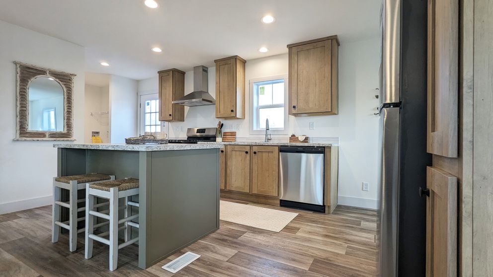The JOHNNY B GOODE Kitchen. This Manufactured Mobile Home features 3 bedrooms and 2 baths.