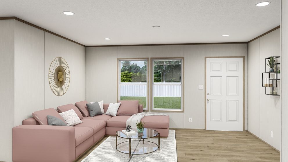 The VISTA Living Room. This Manufactured Mobile Home features 3 bedrooms and 2 baths.