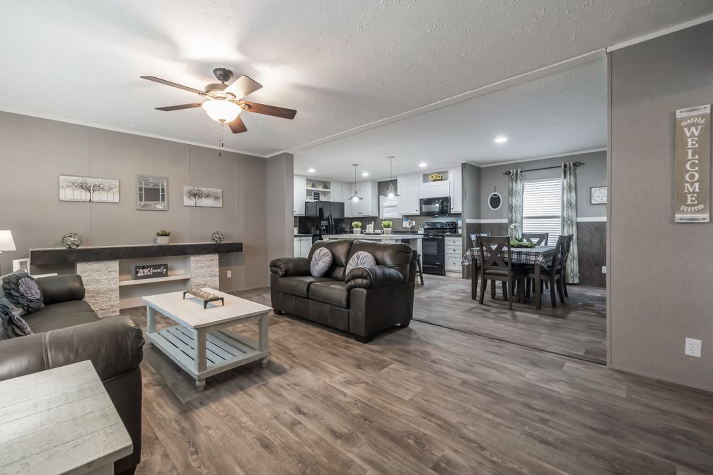 The TRADITION 48 Family Room. This Manufactured Mobile Home features 3 bedrooms and 2 baths.