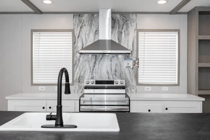 The PLATINUM ANNIVERSARY Kitchen. This Manufactured Mobile Home features 3 bedrooms and 2 baths.