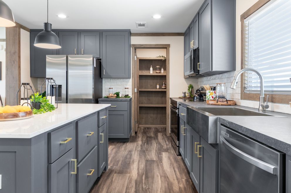 The FARM 4 FLEX Kitchen. This Manufactured Mobile Home features 4 bedrooms and 3 baths.