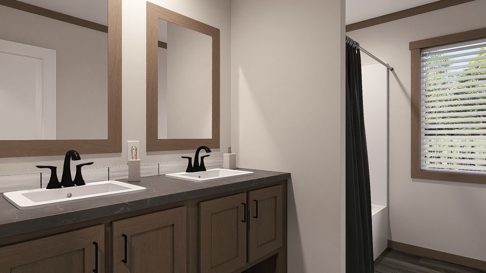 The FARM 4 FLEX ELITE Guest Bathroom. This Manufactured Mobile Home features 4 bedrooms and 3 baths.