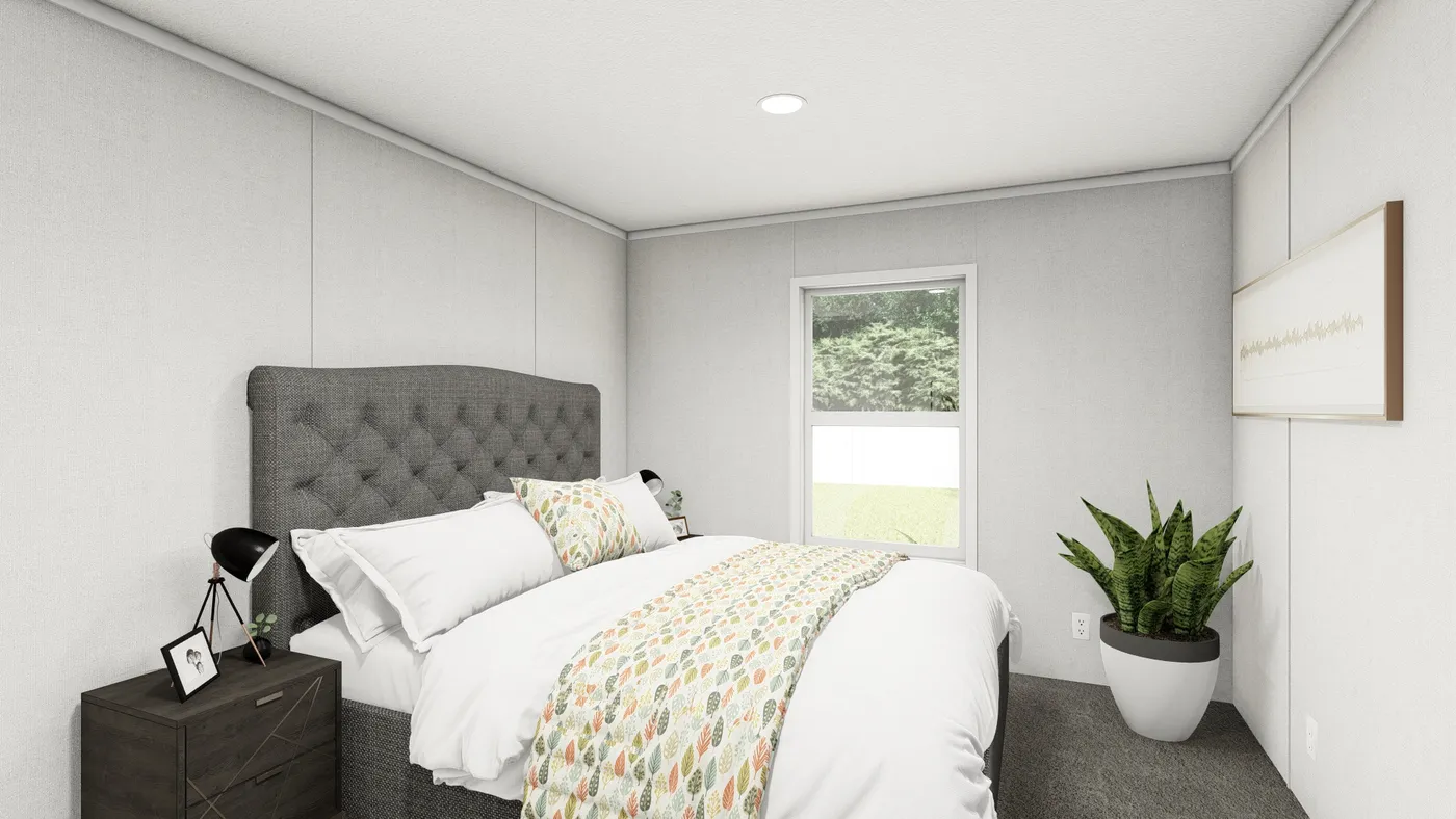 The AMBER Primary Bedroom. This Manufactured Mobile Home features 3 bedrooms and 2 baths.