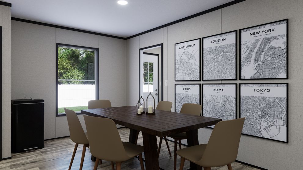 The THE MOUNTAINEER 52 Dining Area. This Manufactured Mobile Home features 3 bedrooms and 2 baths.