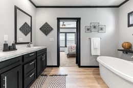 The THE MAUI Primary Bathroom. This Manufactured Mobile Home features 3 bedrooms and 2 baths.