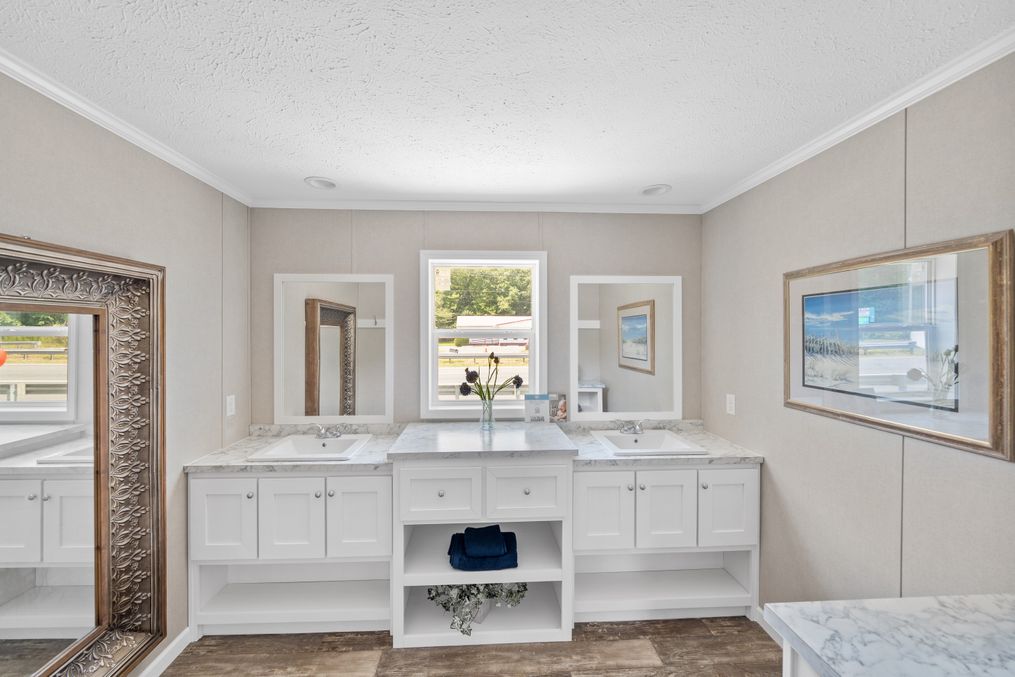 The SWEET BREEZE 64 Master Bathroom. This Manufactured Mobile Home features 3 bedrooms and 2 baths.