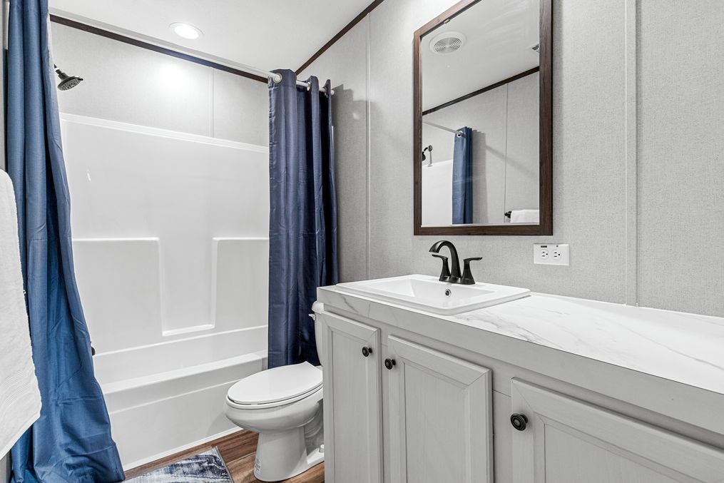 The THE ANNIVERSARY 2.1 Guest Bathroom. This Manufactured Mobile Home features 3 bedrooms and 2 baths.