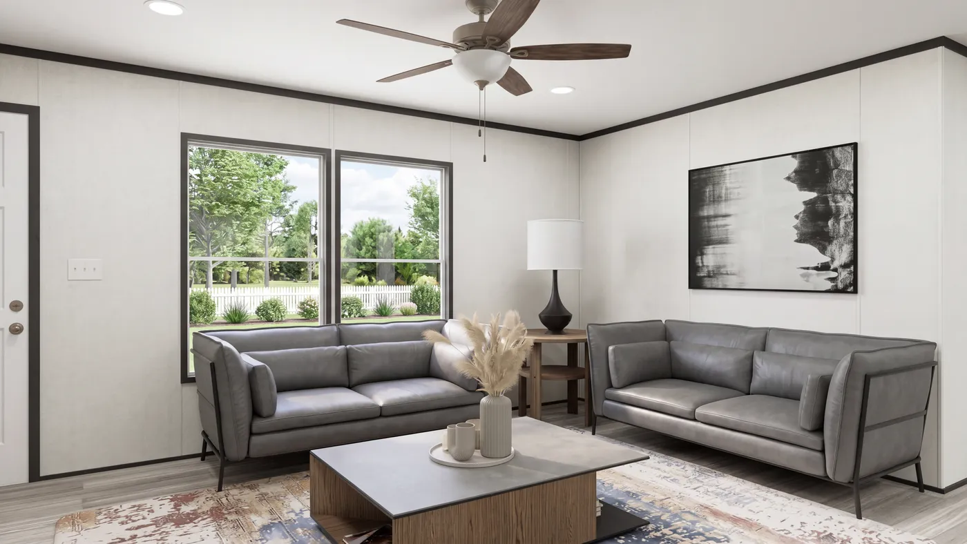 The THE MOUNTAINEER 56 Living Room. This Manufactured Mobile Home features 3 bedrooms and 2 baths.