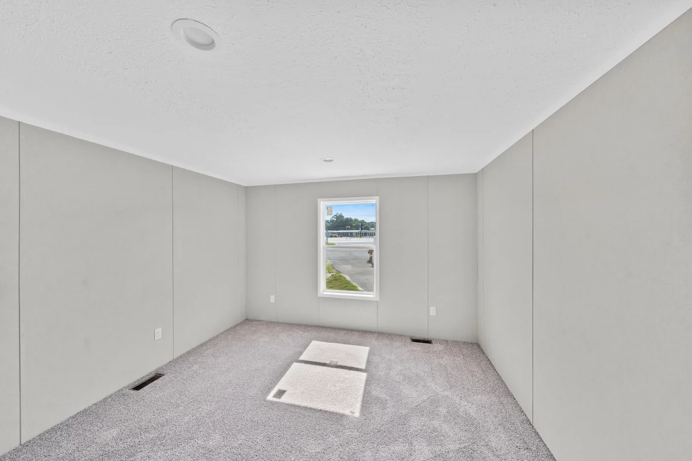 The ZIRCON Guest Bedroom. This Manufactured Mobile Home features 3 bedrooms and 2 baths.