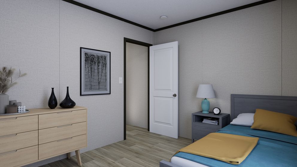 The RALLY Guest Bedroom. This Manufactured Mobile Home features 3 bedrooms and 2 baths.
