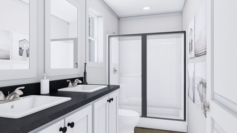 The MY GIRL Primary Bathroom. This Manufactured Mobile Home features 3 bedrooms and 2 baths.