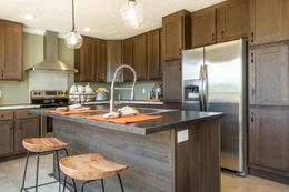 The CLASSIC 60B Kitchen. This Manufactured Mobile Home features 3 bedrooms and 2 baths.