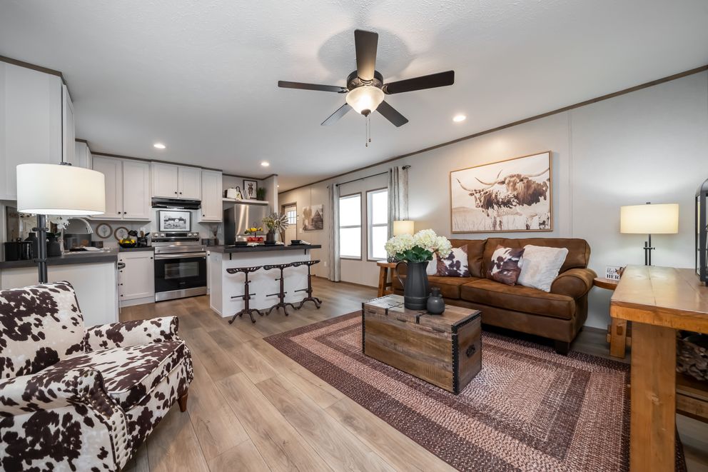 The HORIZON BEACON 16663A Living Room. This Manufactured Mobile Home features 3 bedrooms and 2 baths.