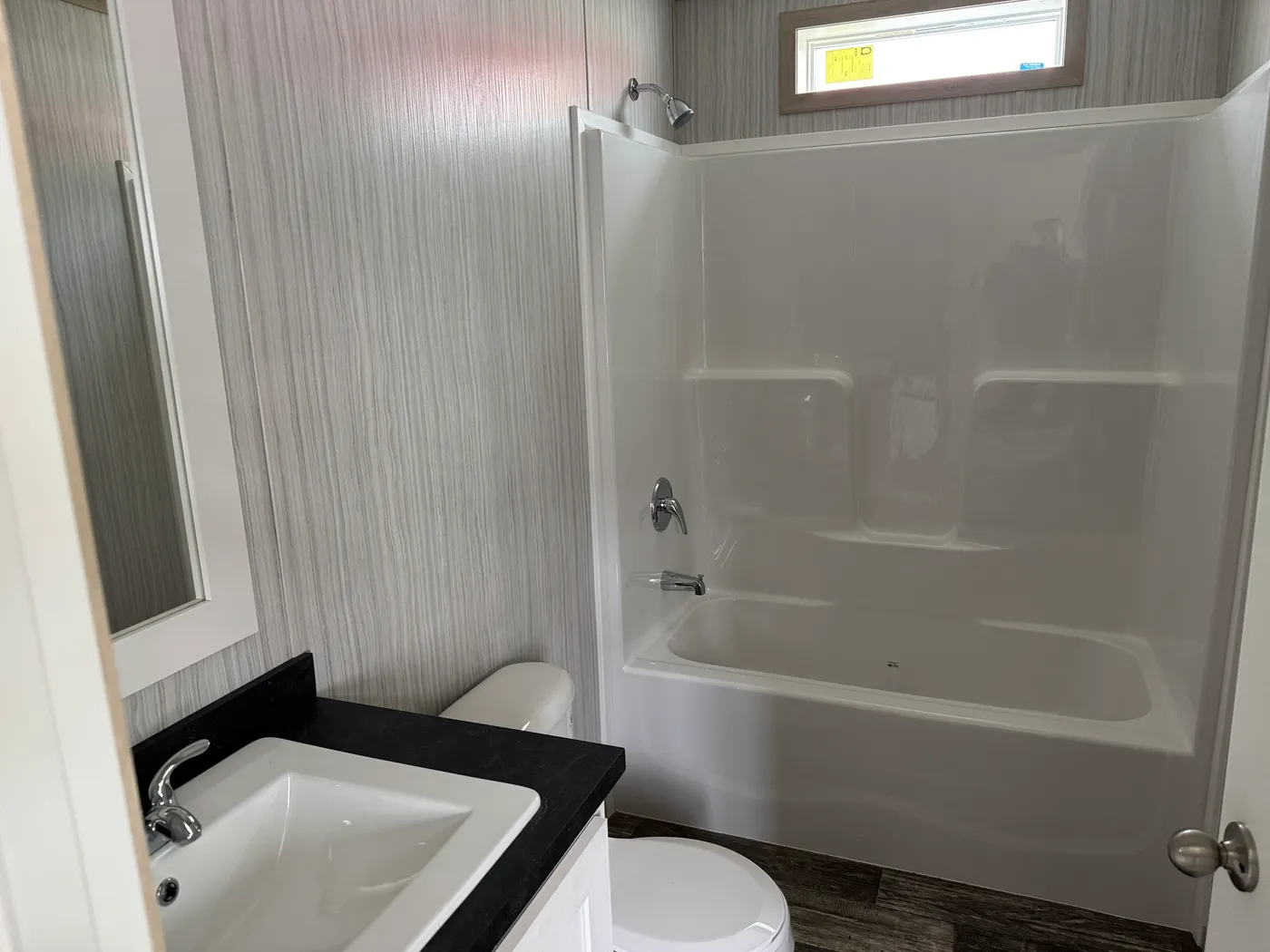 The ONYX Primary Bathroom. This Manufactured Mobile Home features 1 bedroom and 1 bath.