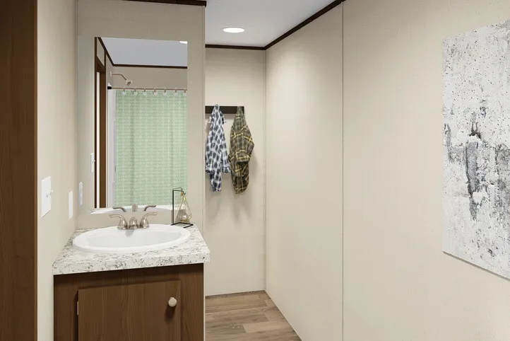 The ELATION Primary Bathroom. This Manufactured Mobile Home features 3 bedrooms and 2 baths.