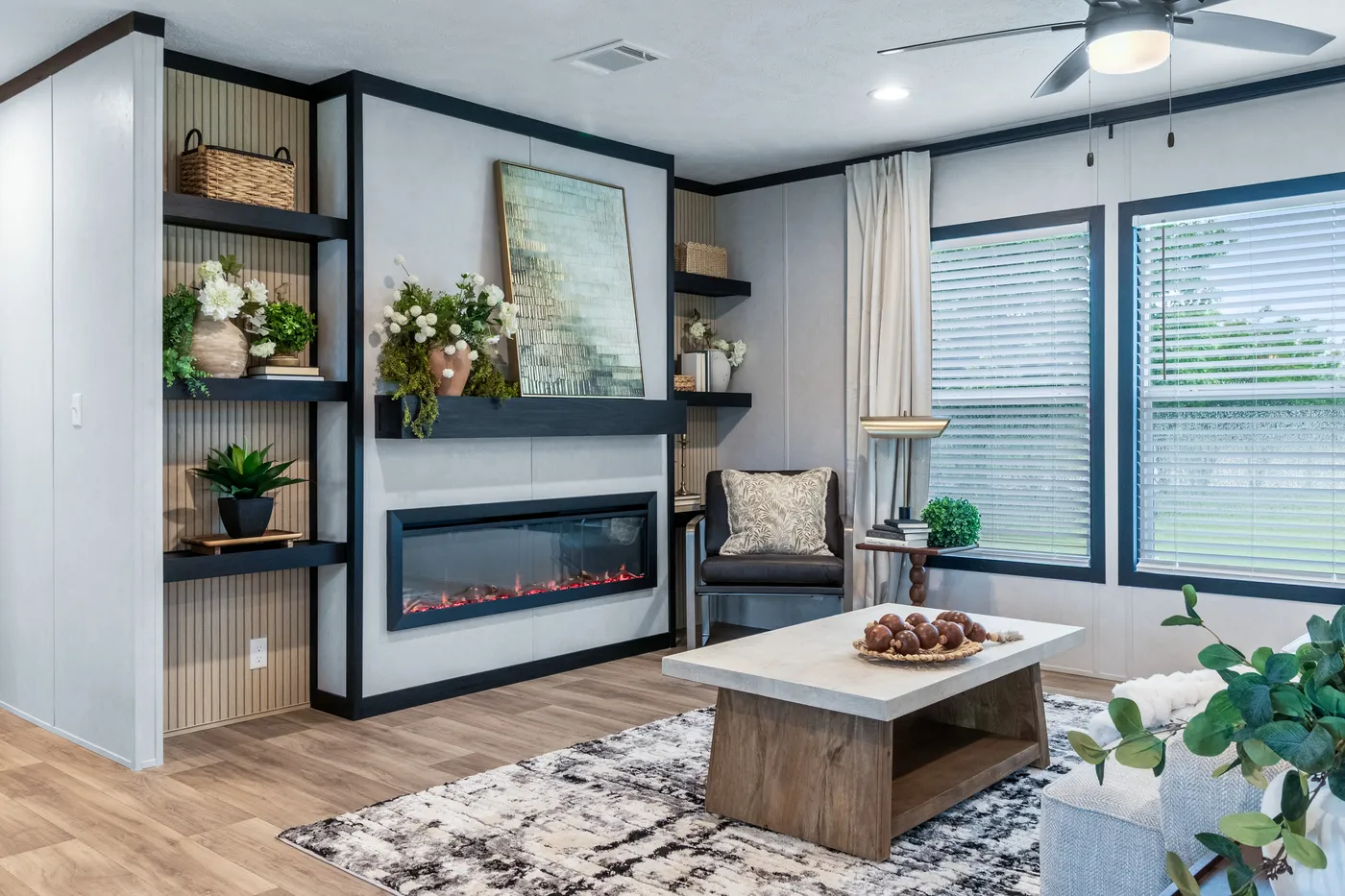 The ODYSSEY Living Room. This Manufactured Mobile Home features 4 bedrooms and 2 baths.