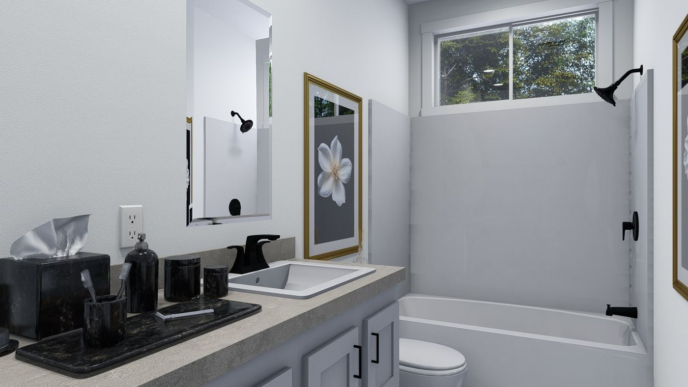 The GRAND Guest Bathroom. This Manufactured Mobile Home features 4 bedrooms and 3 baths.