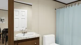 The EXCITEMENT Guest Bathroom. This Manufactured Mobile Home features 3 bedrooms and 2 baths.