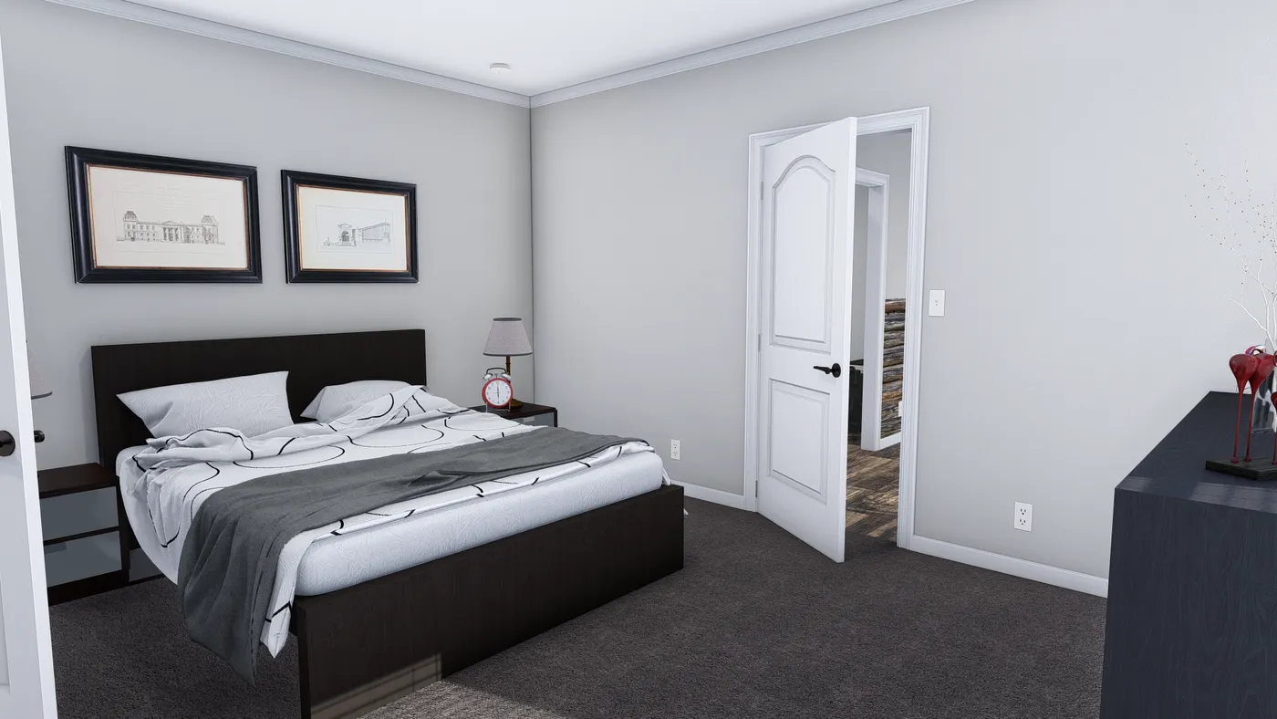 The THE HOLLYWOOD Primary Bedroom. This Manufactured Mobile Home features 3 bedrooms and 2 baths.