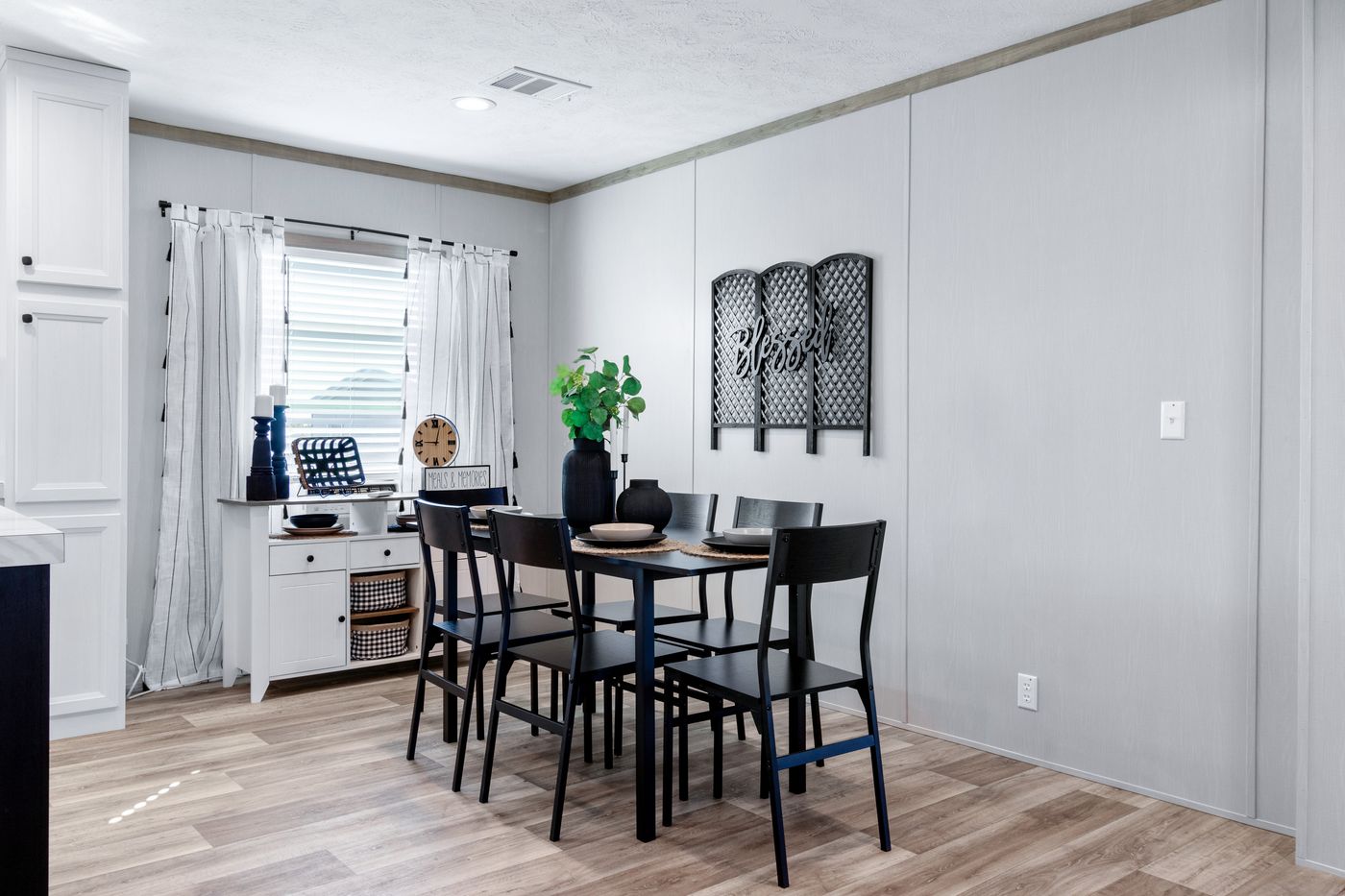 The ANATOLIA XL Dining Area. This Manufactured Mobile Home features 3 bedrooms and 2 baths.