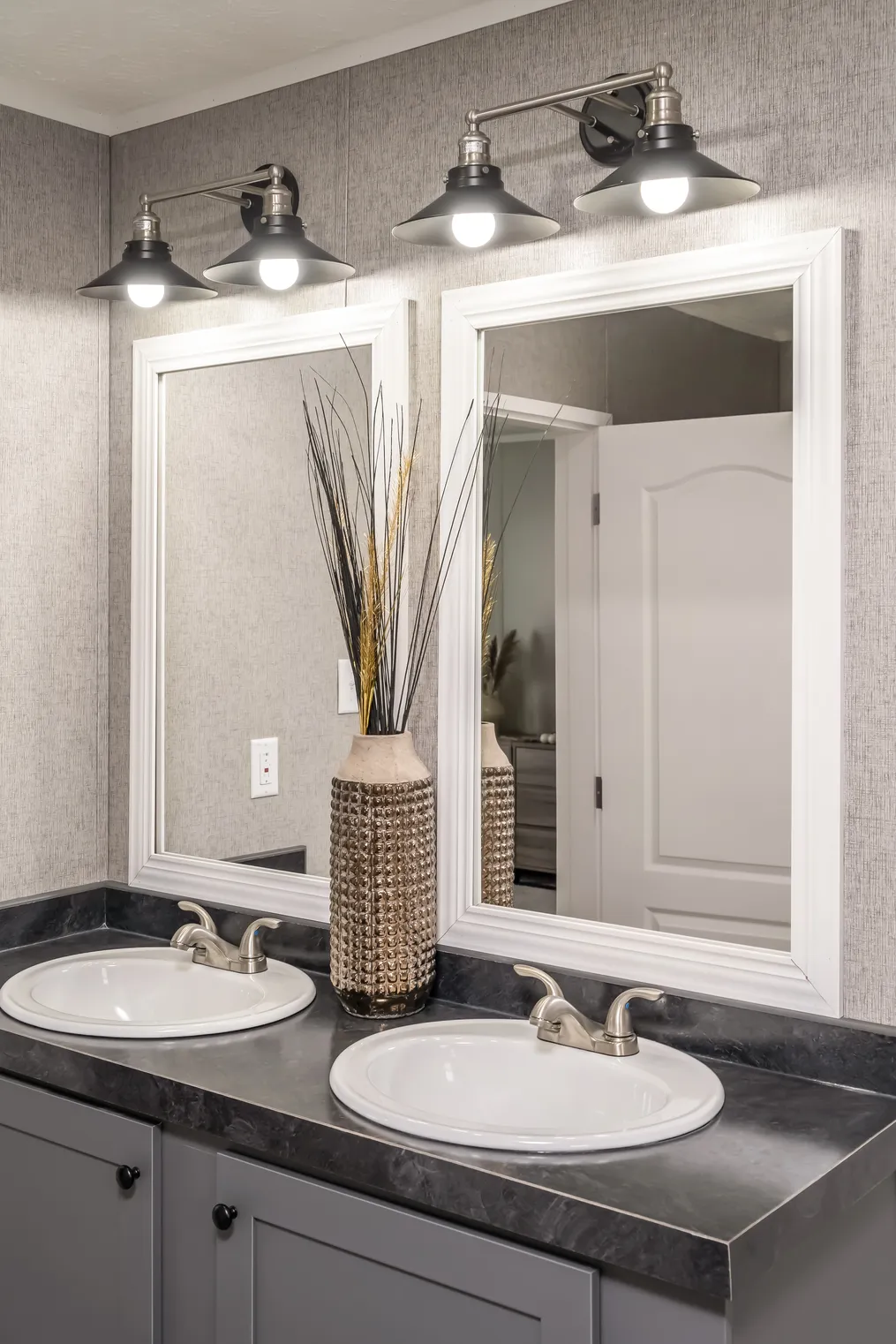 The TRADITION 60B Primary Bathroom. This Manufactured Mobile Home features 3 bedrooms and 2 baths.