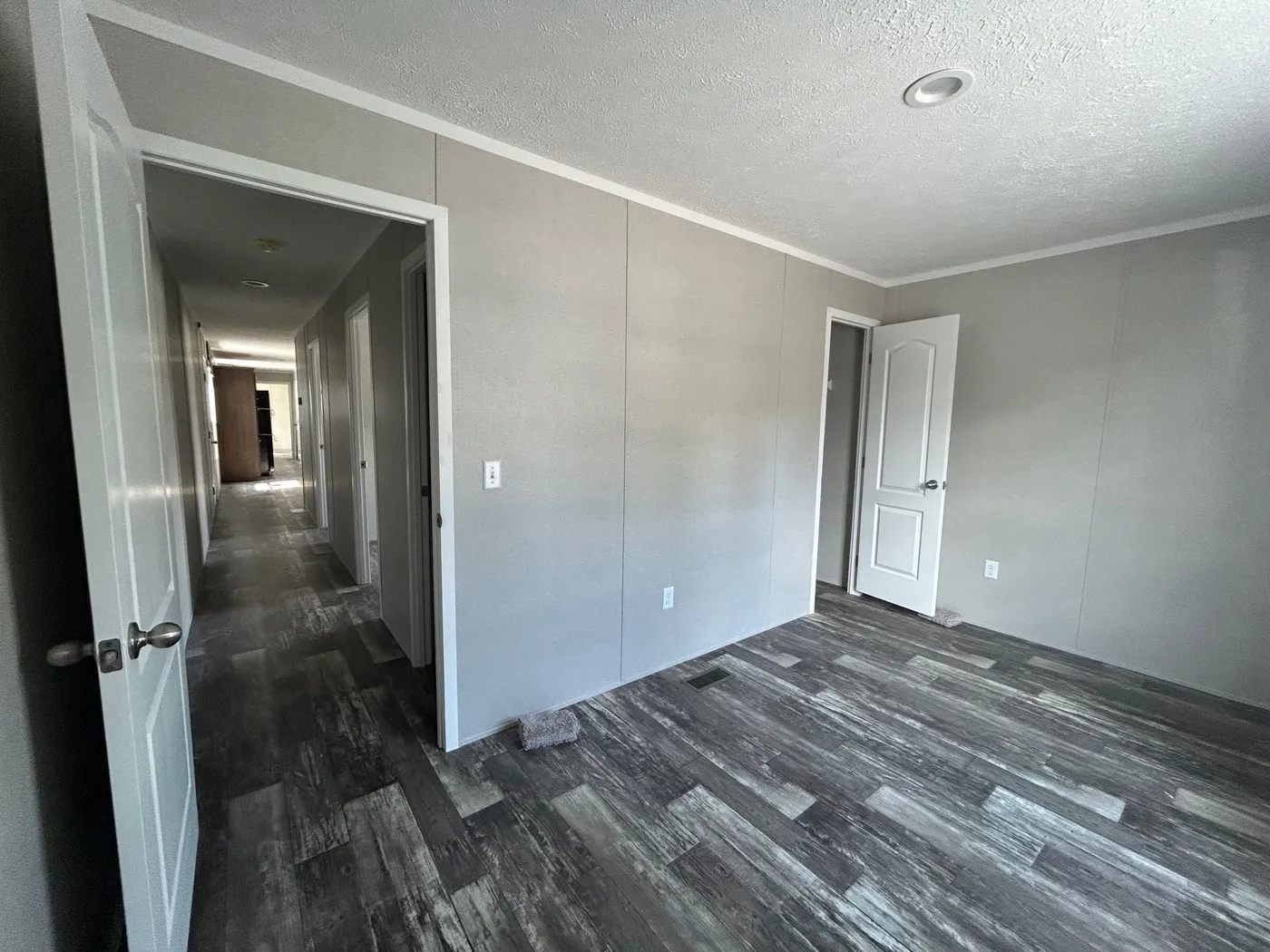 The SAPPHIRE XL 8016-644 Guest Bedroom. This Manufactured Mobile Home features 3 bedrooms and 2 baths.