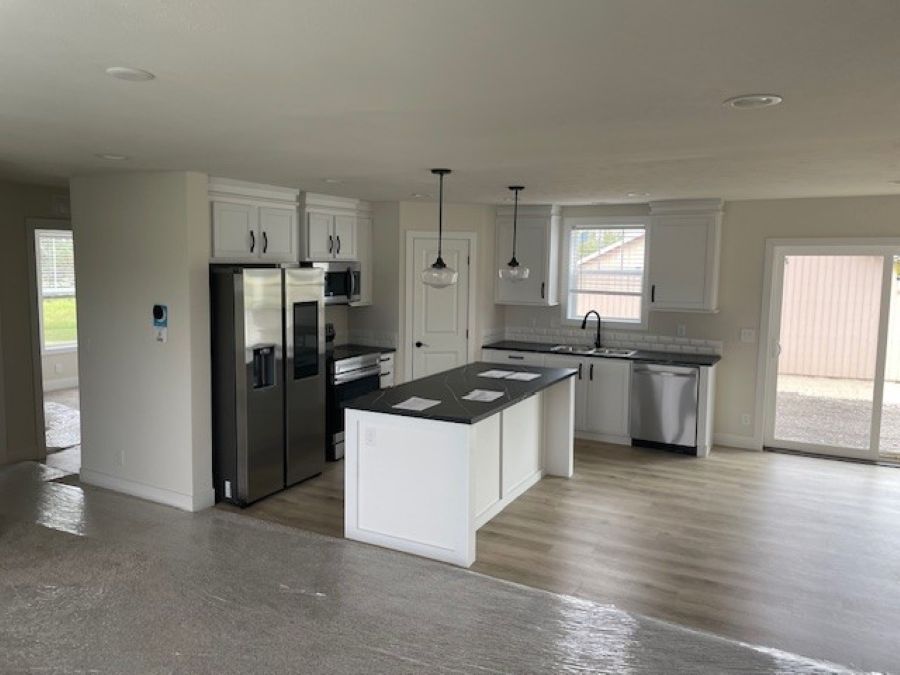 The SPRING MEADOW/4828-MS007-1 SEC Kitchen. This Manufactured Mobile Home features 3 bedrooms and 2 baths.