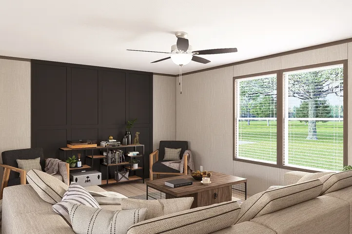 The THE RESERVE 60 Living Room. This Manufactured Mobile Home features 3 bedrooms and 2 baths.