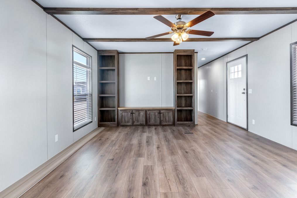 The ANNIVERSARY 16763S Living Room. This Manufactured Mobile Home features 3 bedrooms and 2 baths.