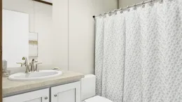 The DESIRE Guest Bathroom. This Manufactured Mobile Home features 3 bedrooms and 2 baths.