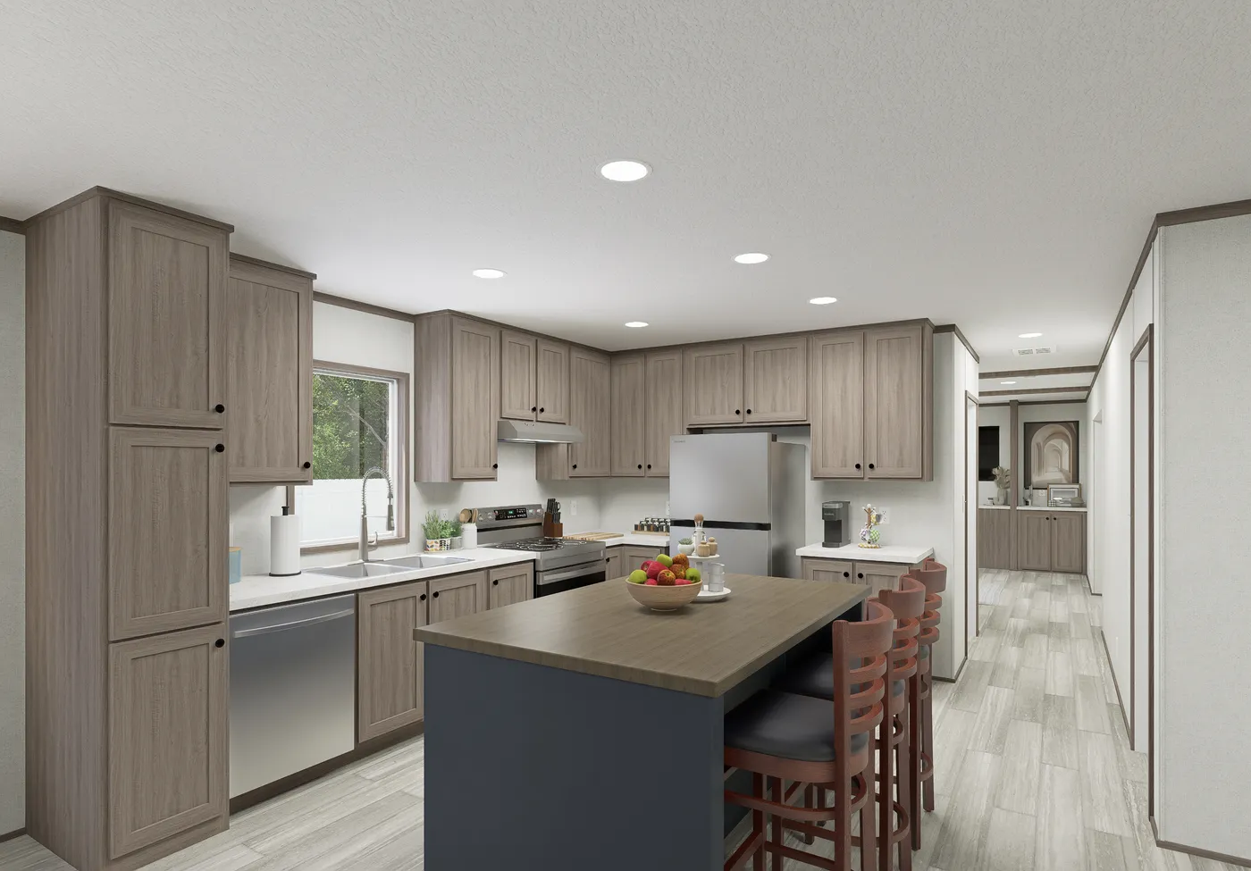 The THE MOUNTAINEER 64 Kitchen. This Manufactured Mobile Home features 3 bedrooms and 2 baths.