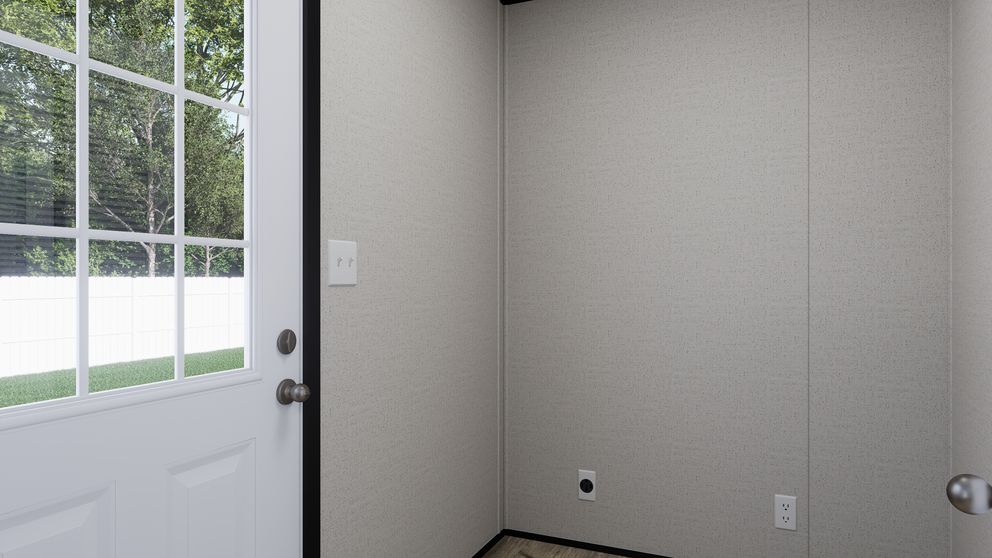 The THE MOUNTAINEER 52 Utility Room. This Manufactured Mobile Home features 3 bedrooms and 2 baths.
