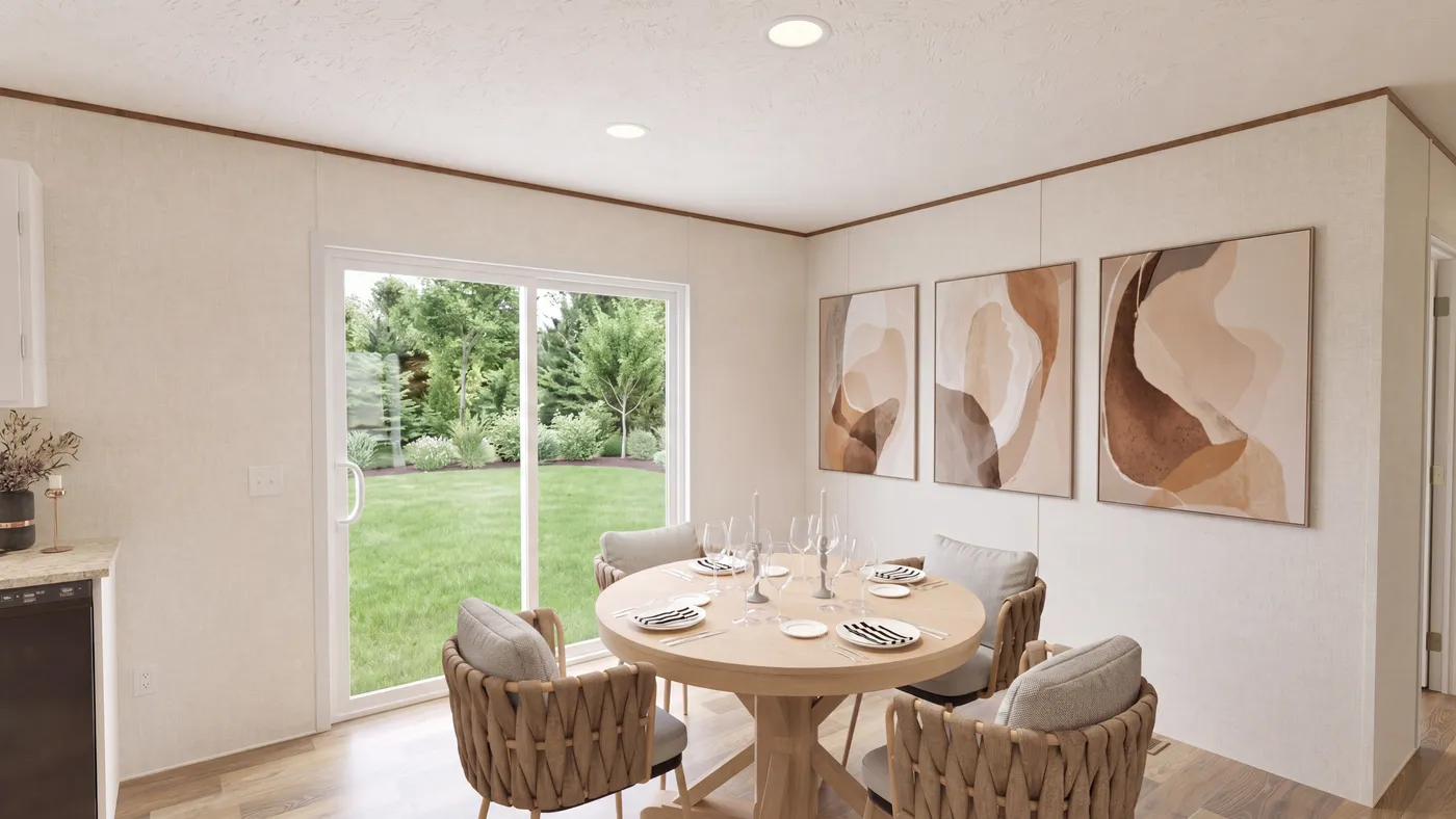 The REDWOOD Dining Area. This Manufactured Mobile Home features 5 bedrooms and 3 baths.