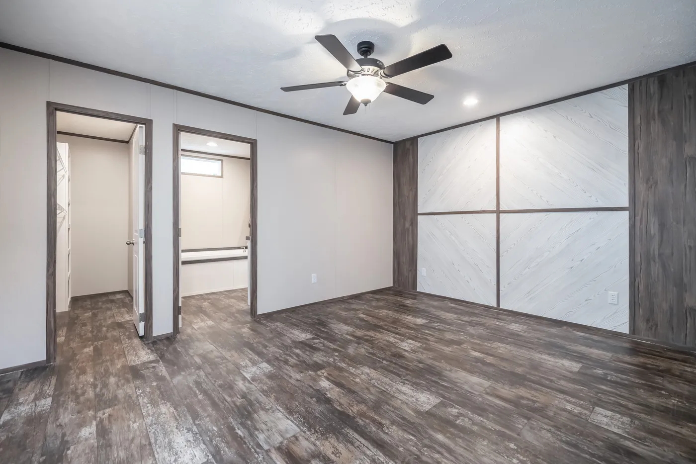 The THE GENERAL Primary Bedroom. This Manufactured Mobile Home features 3 bedrooms and 2 baths.